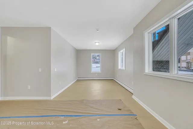 a view of an empty room with window