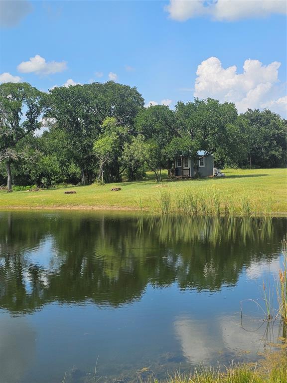 101 Private Road Whitney, TX 76692 - Photo 12 of 30 a view of a lake in middle of the town
