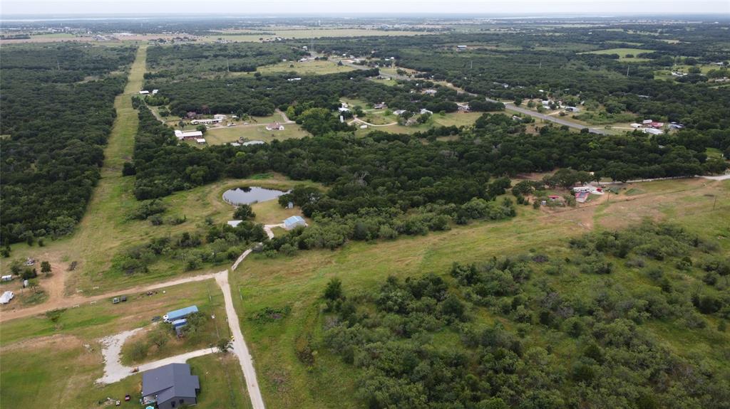 101 Private Road Whitney, TX 76692 - Photo 22 of 30 an aerial view of residential houses with outdoor space