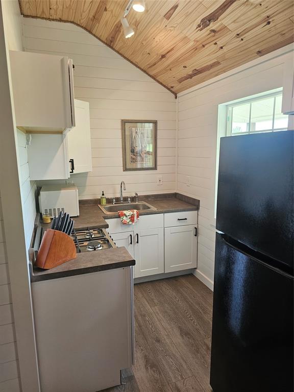 101 Private Road Whitney, TX 76692 - Photo 28 of 30 a white kitchen with a stove top oven