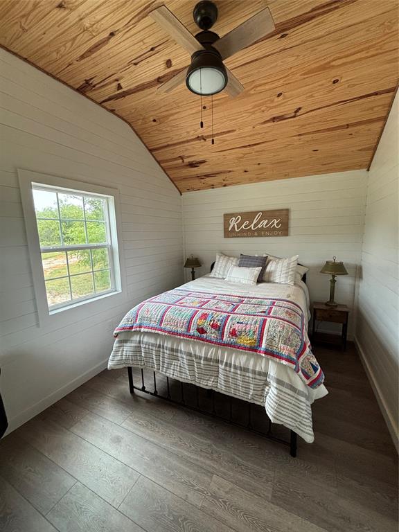 101 Private Road Whitney, TX 76692 - Photo 29 of 30 a bedroom with a bed and window