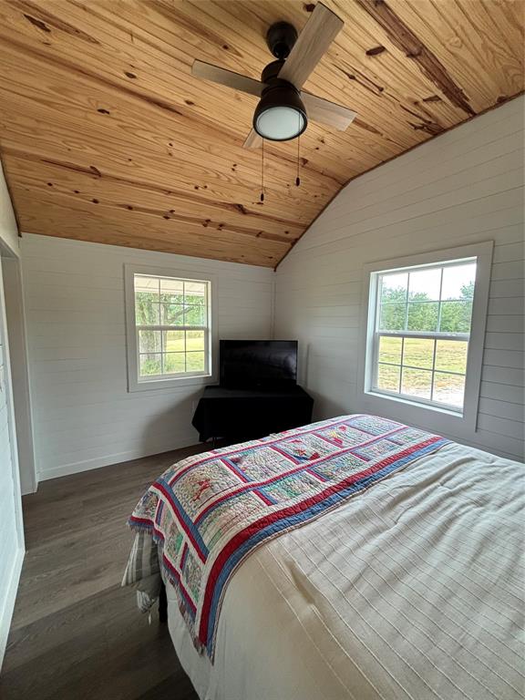101 Private Road Whitney, TX 76692 - Photo 30 of 30 a bedroom with a bed and a window