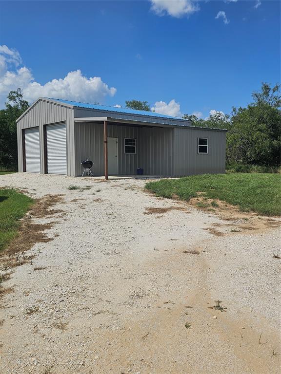101 Private Road Whitney, TX 76692 - Photo 5 of 30 a house with a yard