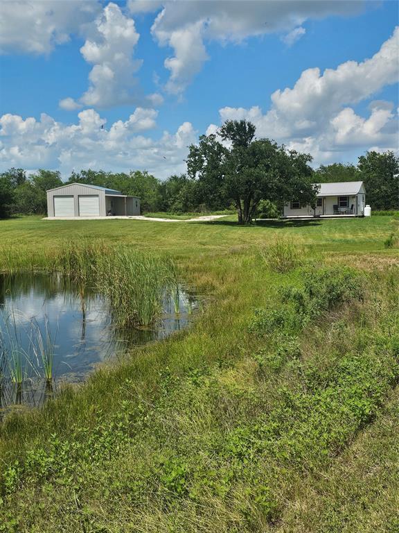 101 Private Road Whitney, TX 76692 - Photo 9 of 30 a view of a lake with a big yard