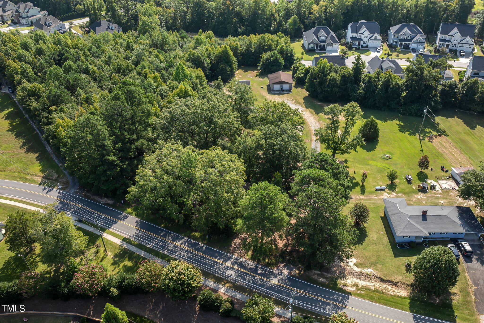 2801 Evans Road Apex, NC 27502 - Photo 8 of 10 an aerial view of houses with yard