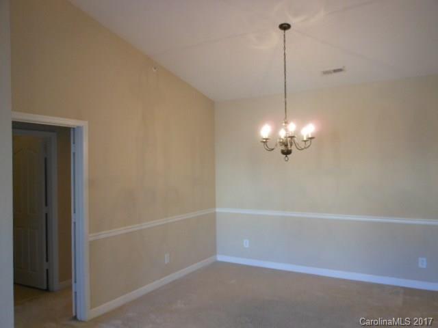 16644 Amberside Road East, Unit E Cornelius, NC 28031 - Photo 6 of 16 a view of a decorative light in a room
