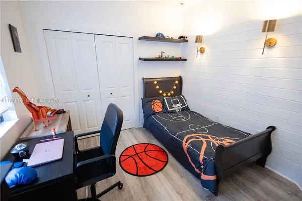 a room with toys and wooden floor