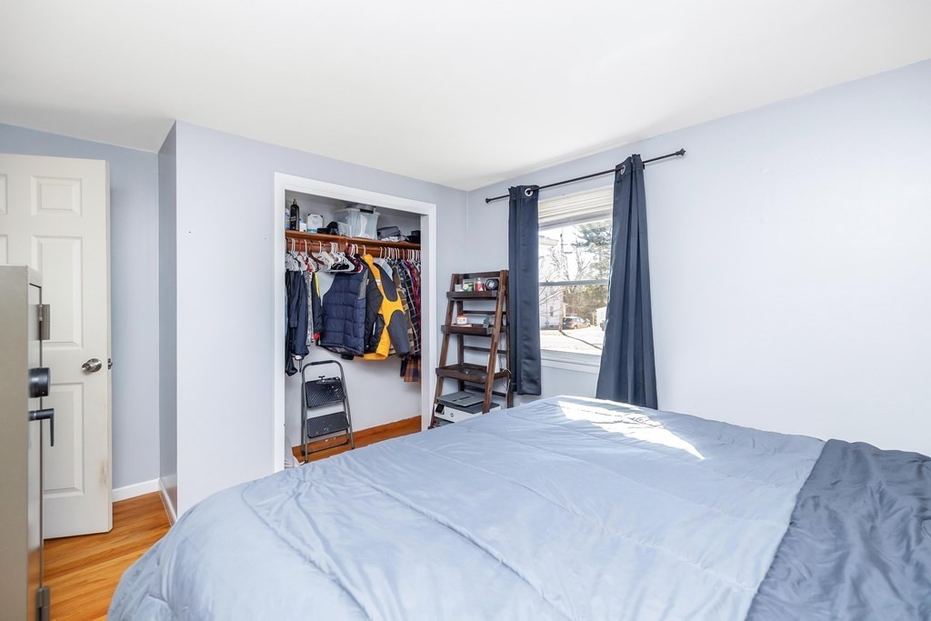 37 Coolidge Road Chicopee, MA 01013 - Photo 14 of 35 a bedroom with a bed and a window