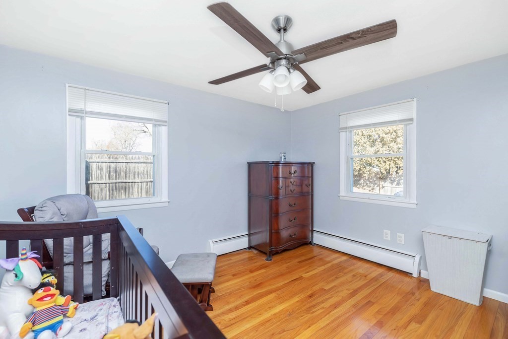 37 Coolidge Road Chicopee, MA 01013 - Photo 15 of 35 a bedroom with furniture window and wooden floor