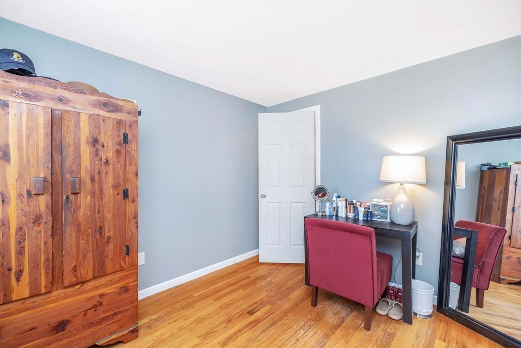 37 Coolidge Road Chicopee, MA 01013 - Photo 20 of 35 a view of a bedroom with wooden floor and closet