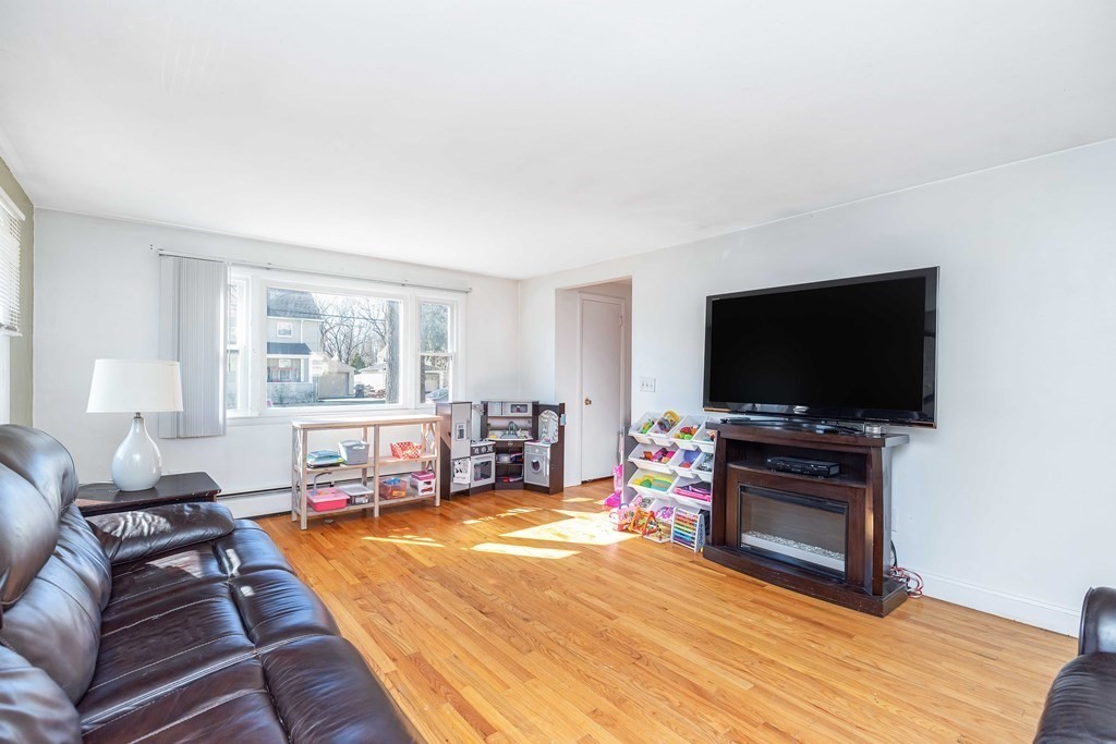 37 Coolidge Road Chicopee, MA 01013 - Photo 3 of 35 a living room with furniture and a flat screen tv