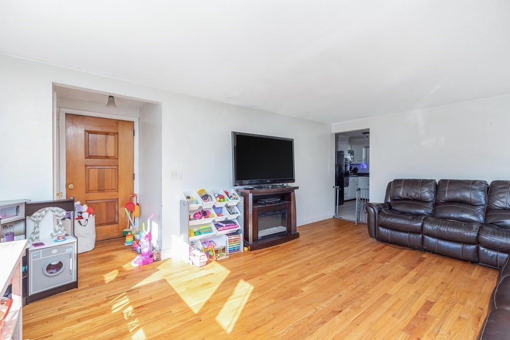 37 Coolidge Road Chicopee, MA 01013 - Photo 6 of 35 a living room with furniture and a flat screen tv