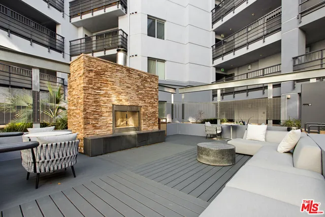 a view of swimming pool with outdoor seating