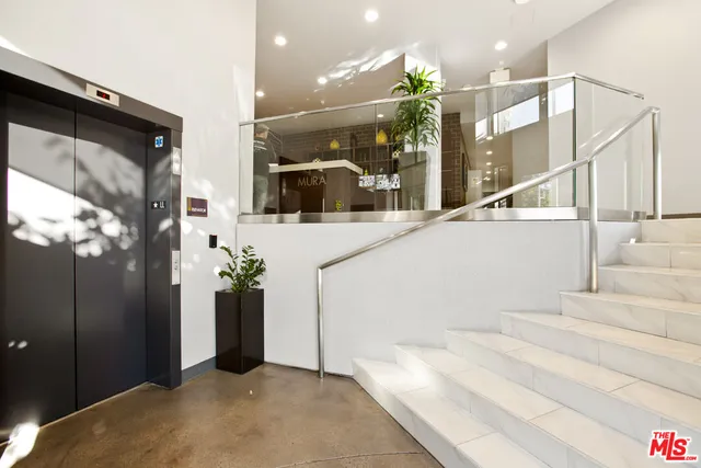 a view of entryway with stairs