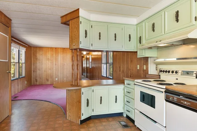 a view of storage and utility room with washer and dryer