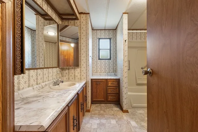 a view of a city with lush green forest