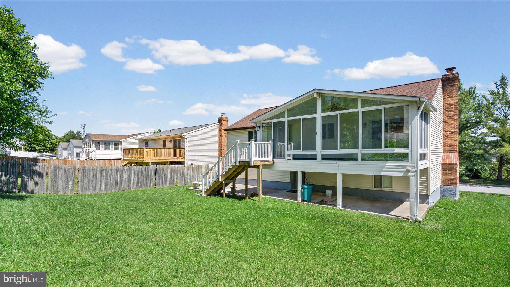3709 Redberry Way Nottingham, MD 21236 - Photo 43 of 45 a view of a house with a backyard and a deck
