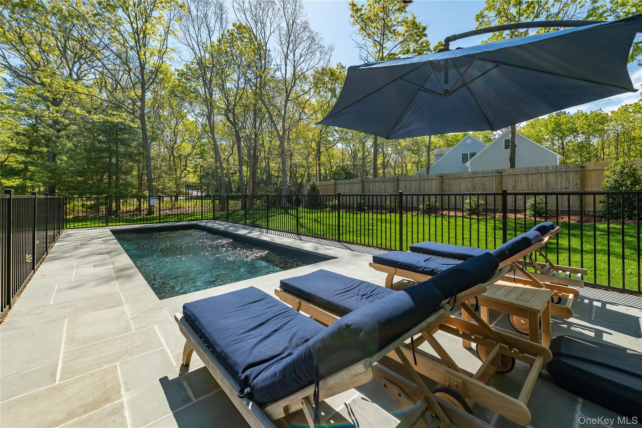 16 Hildreth Road Hampton Bays, NY 11946 - Photo 2 of 29 an outdoor space with furniture