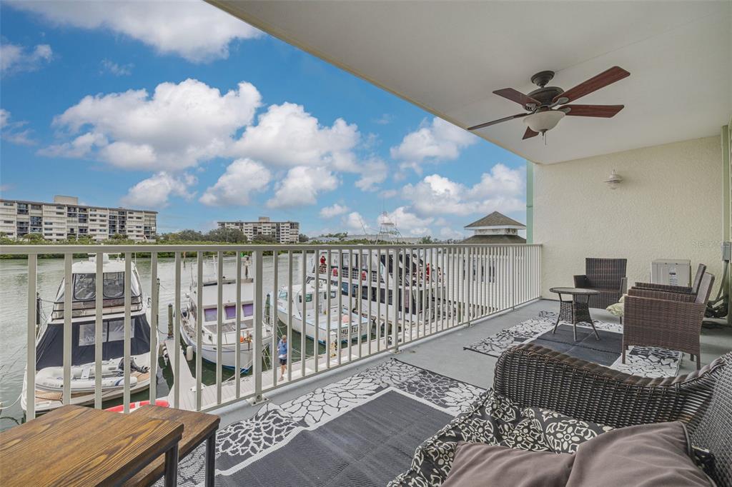 399 2nd Street, Unit 219 Indian Rocks Beach, FL 33785 - Photo 16 of 46 a view of a balcony with furniture