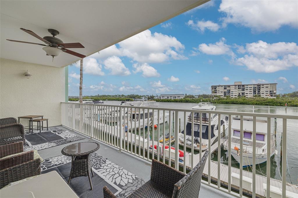 399 2nd Street, Unit 219 Indian Rocks Beach, FL 33785 - Photo 17 of 46 a view of a balcony with furniture