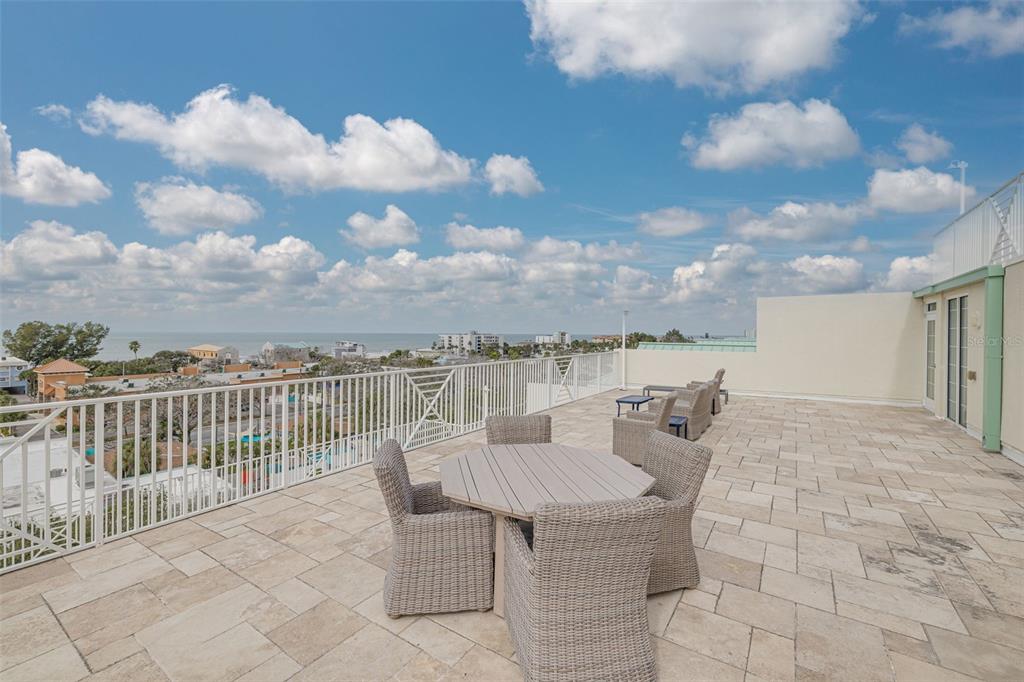 399 2nd Street, Unit 219 Indian Rocks Beach, FL 33785 - Photo 30 of 46 a terrace with outdoor seating