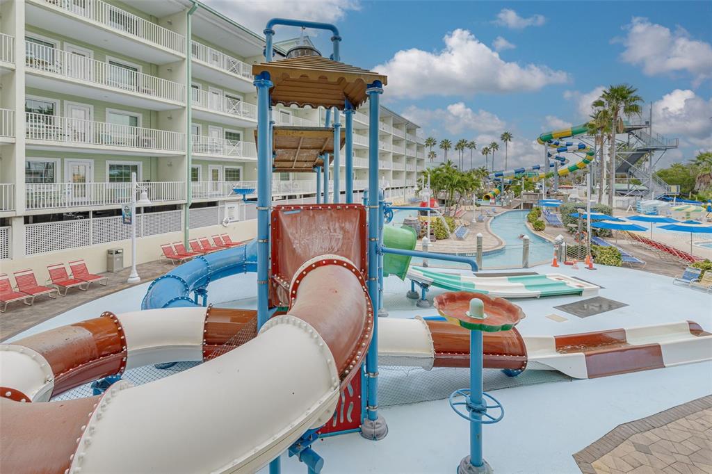 399 2nd Street, Unit 219 Indian Rocks Beach, FL 33785 - Photo 35 of 46 a outdoor living space with patio furniture