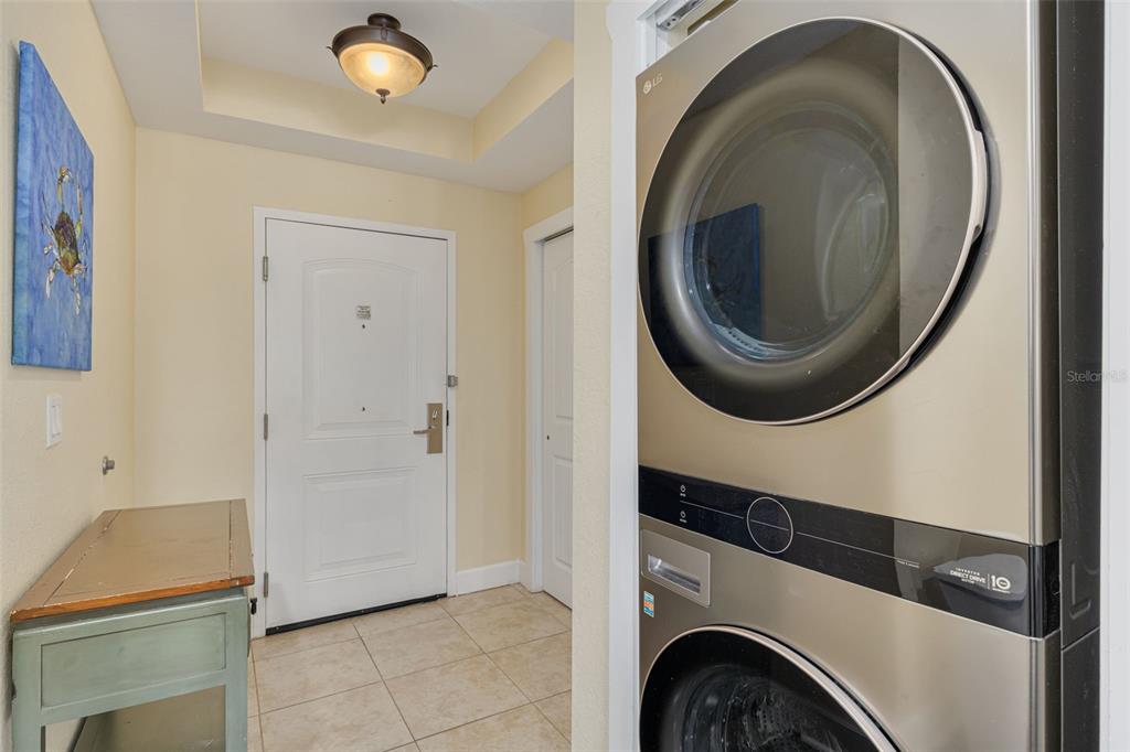 399 2nd Street, Unit 219 Indian Rocks Beach, FL 33785 - Photo 7 of 46 a room with a washer and dryer
