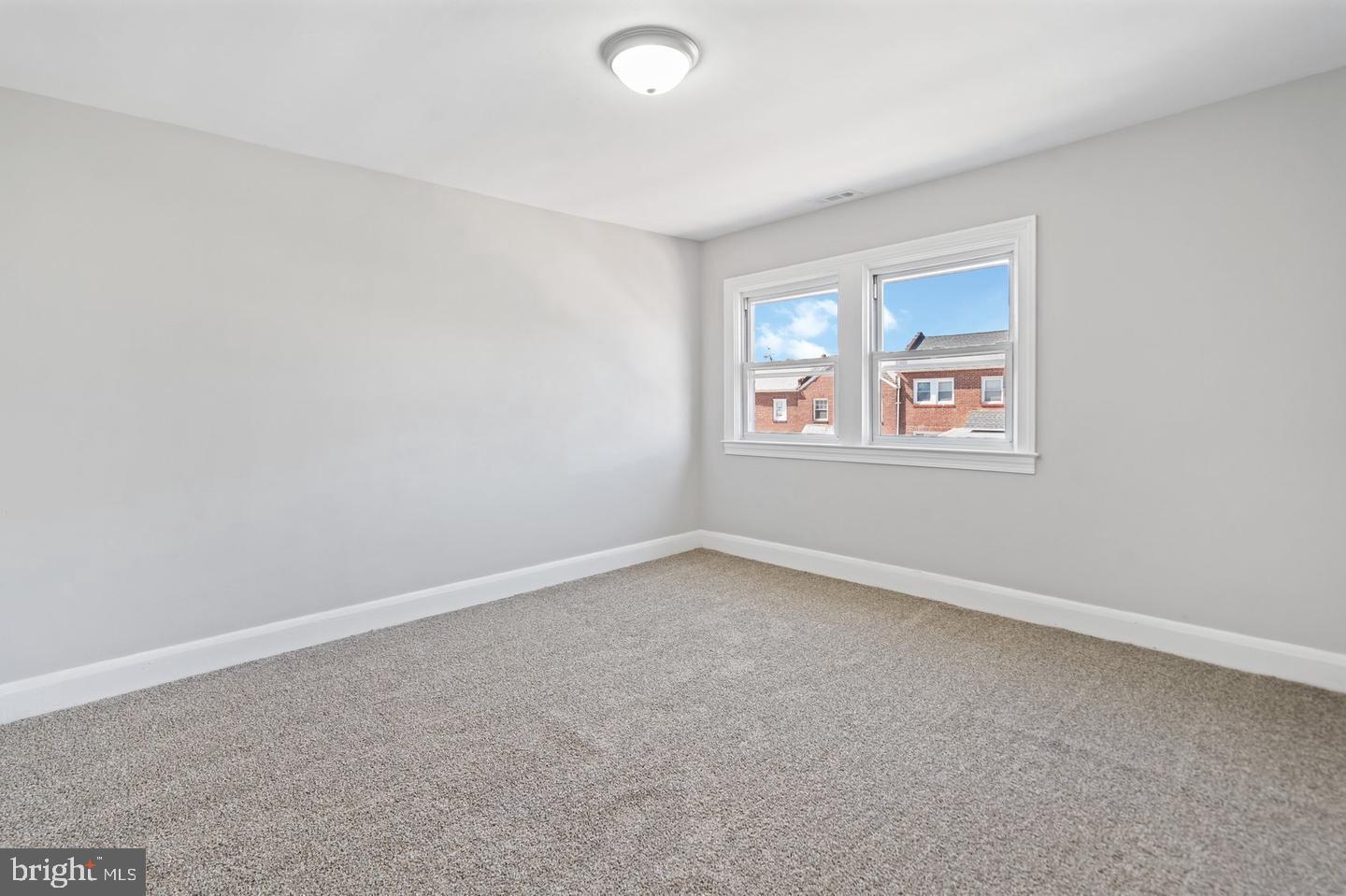 5 North Rosedale Street Baltimore, MD 21229 - Photo 7 of 11 an empty room with a window
