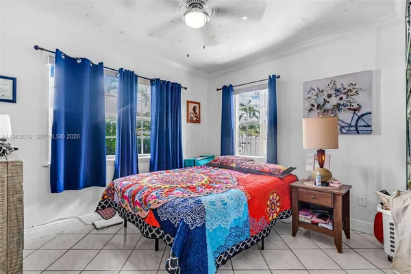 a kitchen with stainless steel appliances granite countertop a refrigerator a stove top oven a sink dishwasher and wooden cabinets