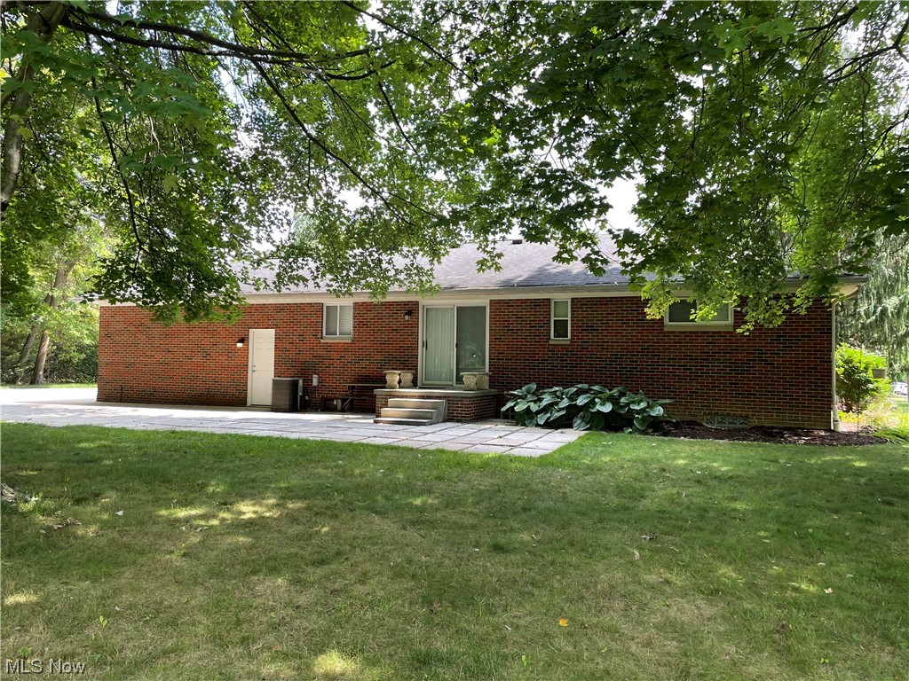 3268 Morewood Road Akron, OH 44333 - Photo 26 of 29 Rear elevation featuring a patio area and yard