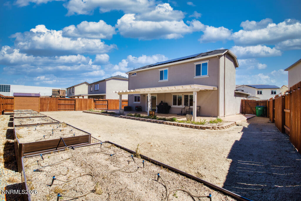 8957 Buffalo Grove Drive Reno, NV 89506 - Photo 41 of 59 a front view of a house with street