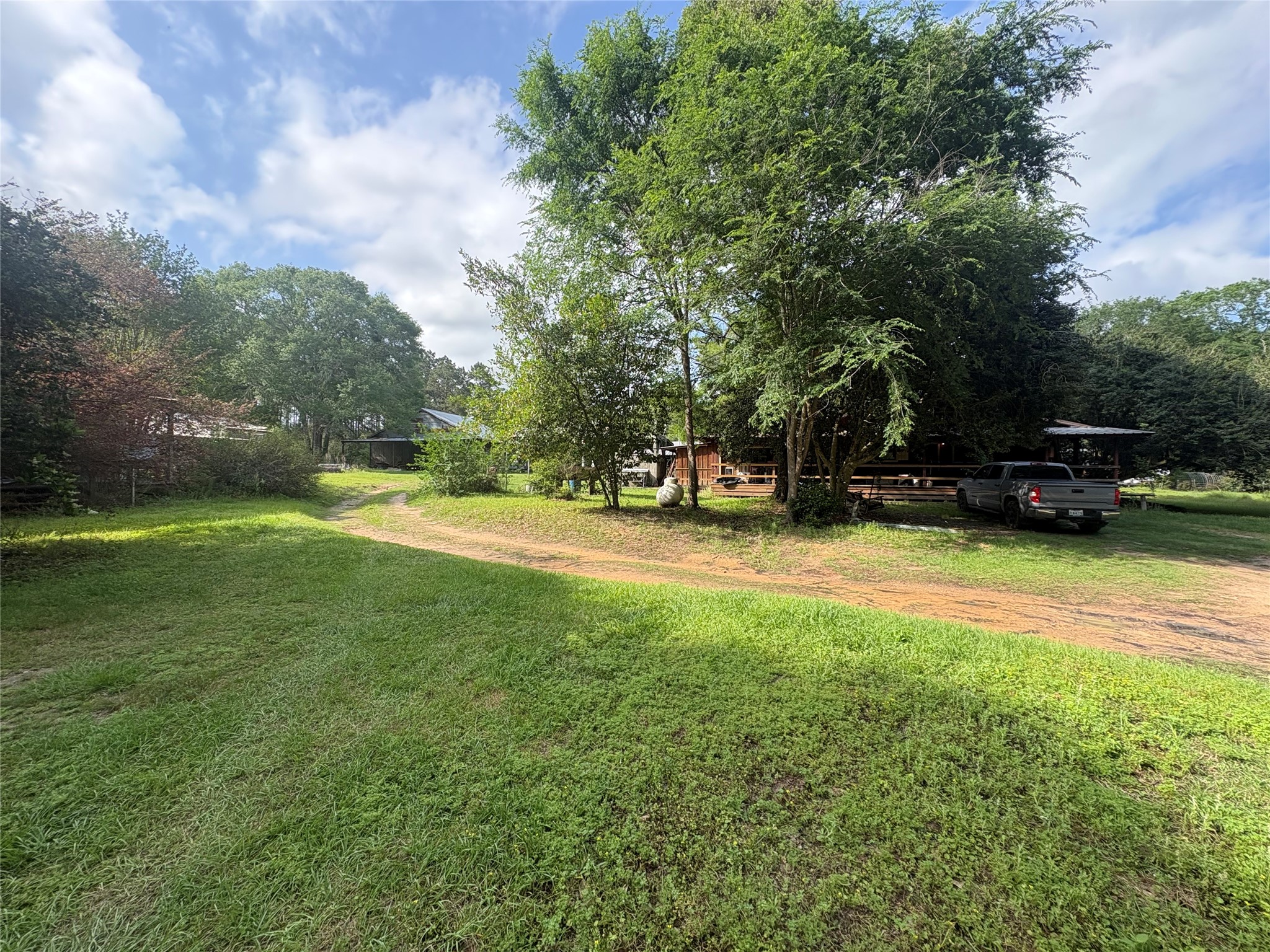 550 Dogwood Road Cleveland, TX 77328 - Photo 1 of 49 a view of a park with large trees