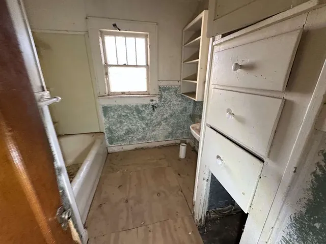 a view of an empty room with window