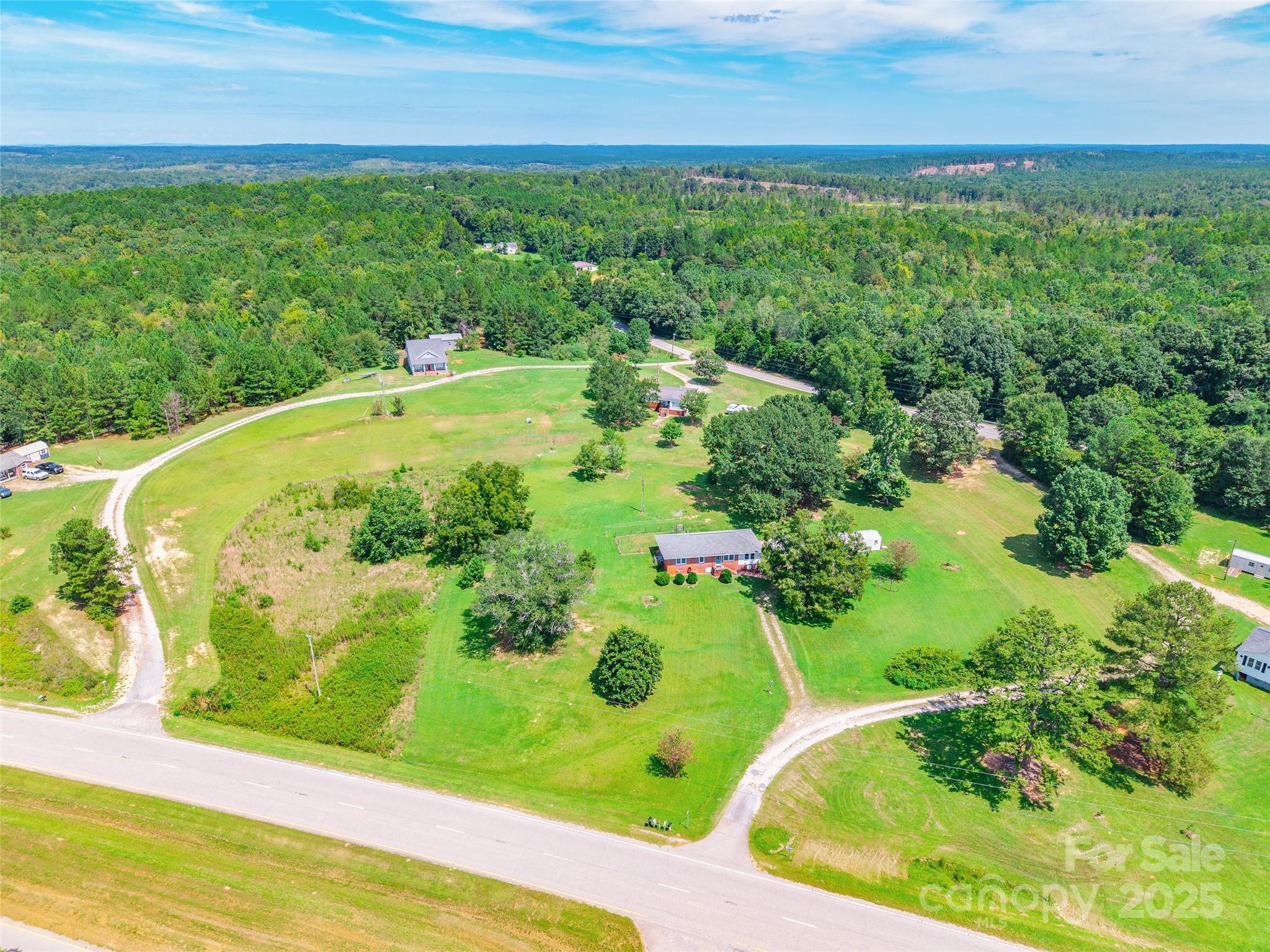 3505 Valley Drive Chester, SC 29706 - Photo 2 of 28 a view of a garden with a fountain