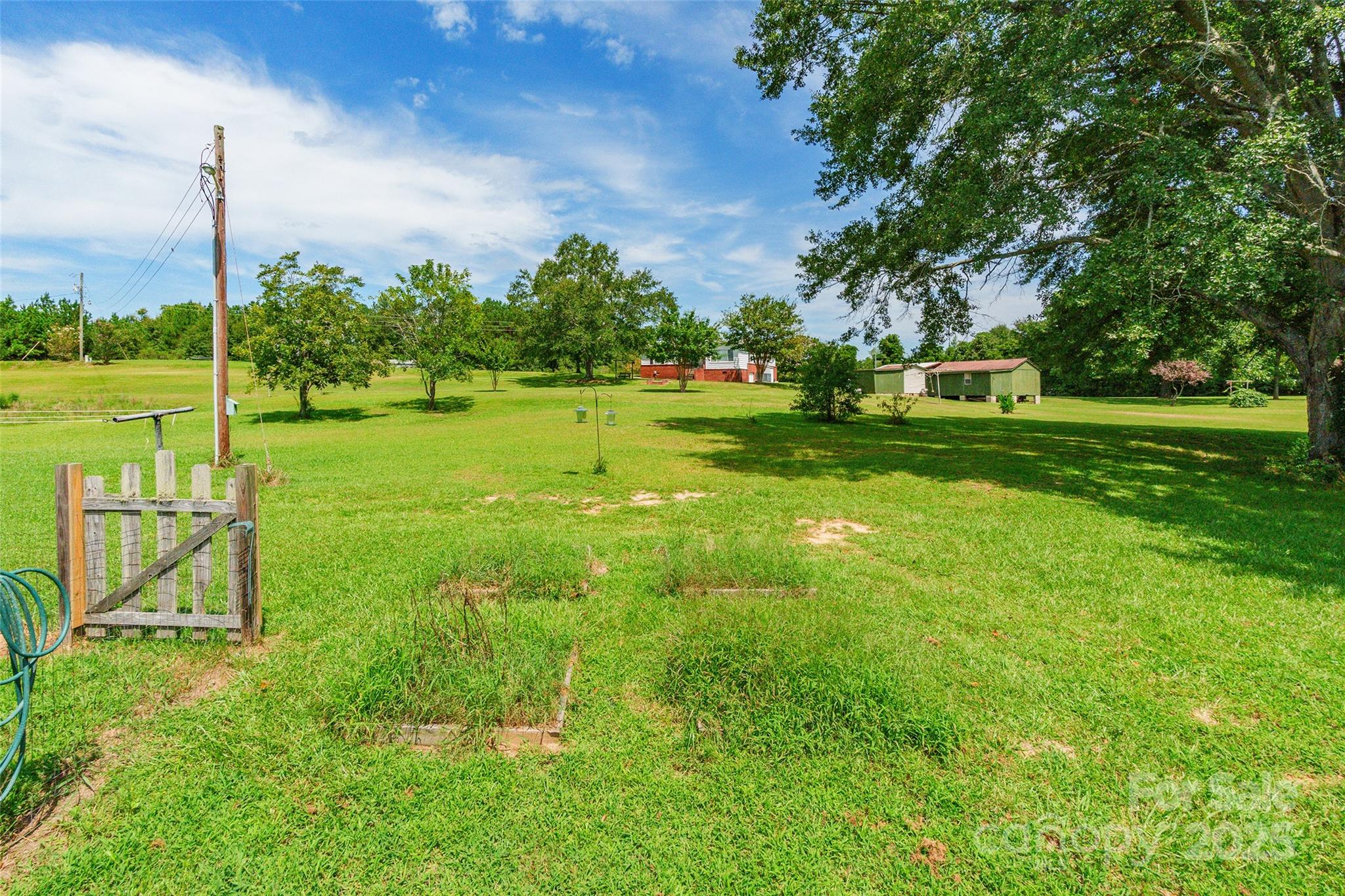 3505 Valley Drive Chester, SC 29706 - Photo 23 of 28 a view of a golf course with a lake