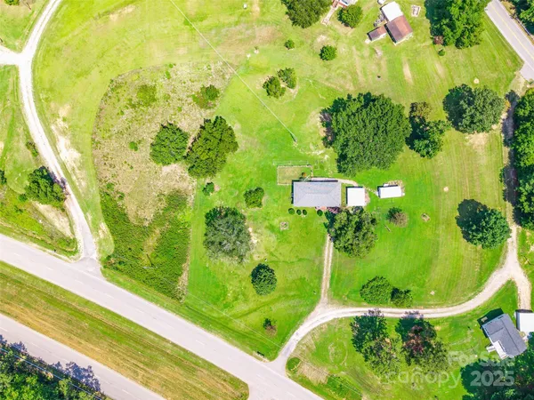 swimming pool view with a garden and swimming pool