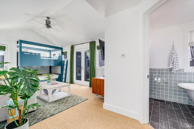 a bathroom with a sink toilet and mirror