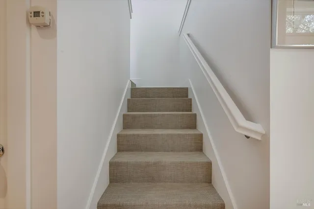 a view of swimming pool from a balcony