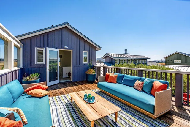 a view of a street with a building in the background