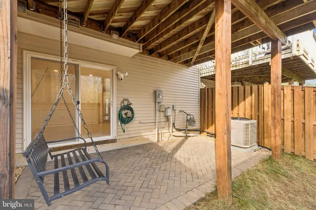 a building outdoor space with patio furniture