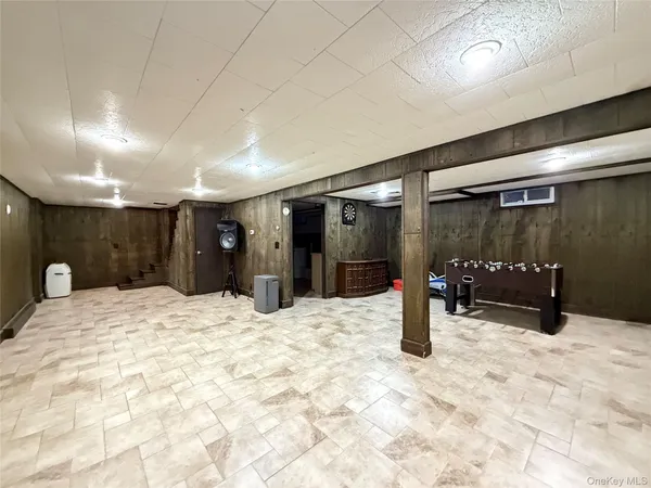 a view of balcony with wooden floor and outdoor seating
