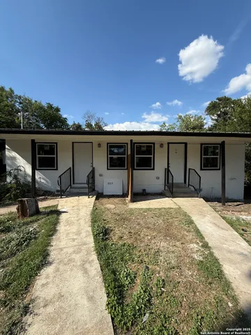 a front view of house with yard