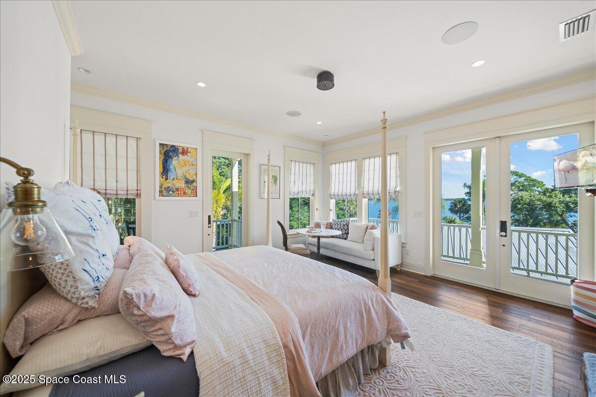 11 Mitchell Street Cocoa, FL 32922 - Photo 43 of 159 a bedroom with a large bed and a large window