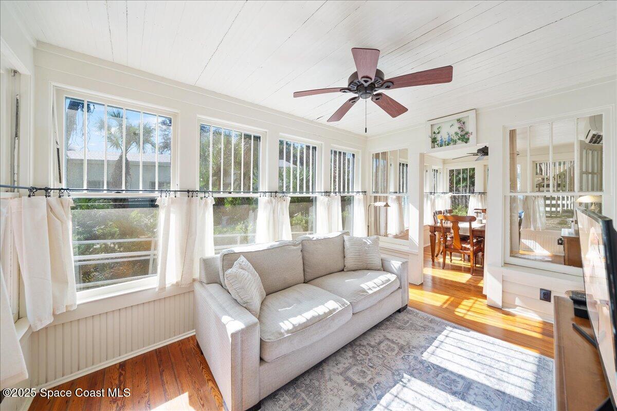11 Mitchell Street Cocoa, FL 32922 - Photo 76 of 159 a living room with furniture and a window