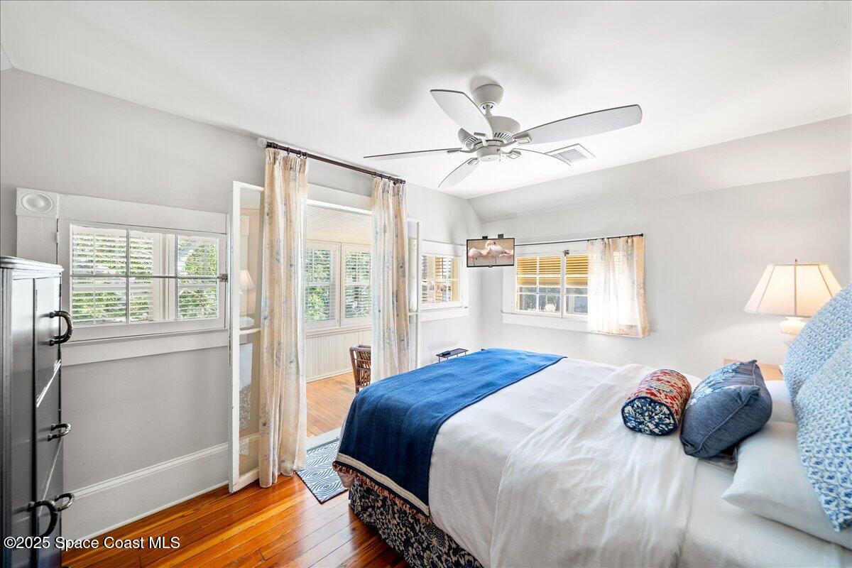 11 Mitchell Street Cocoa, FL 32922 - Photo 86 of 159 a bedroom with a large bed and a window