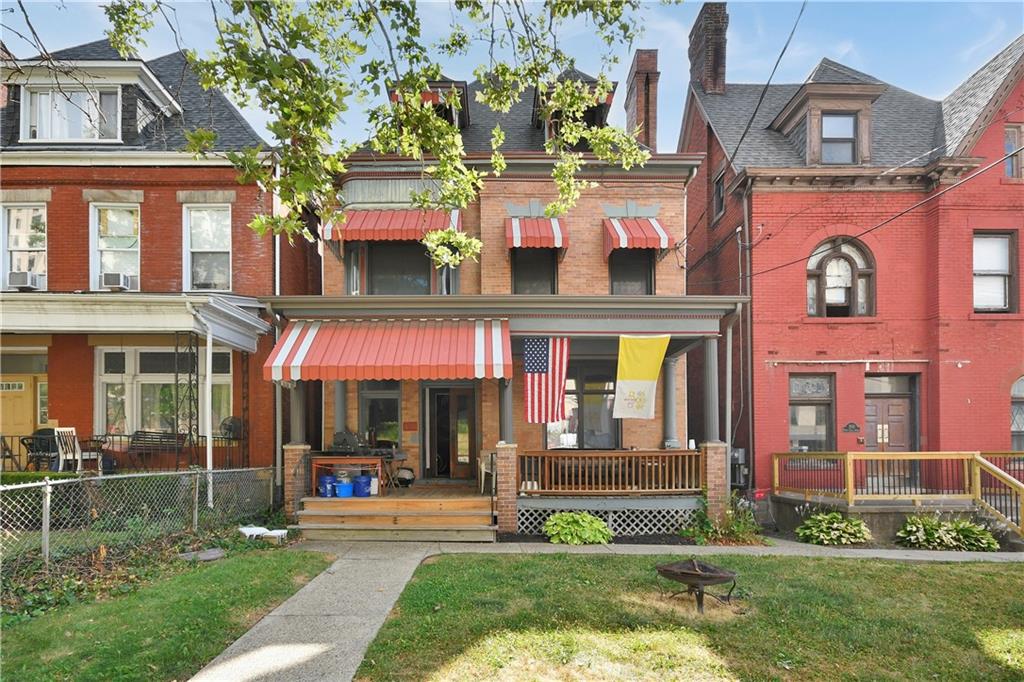 352 North Craig Street, Unit 5 Pittsburgh, PA 15213 - Photo 1 of 10 a view of a brick building with a yard