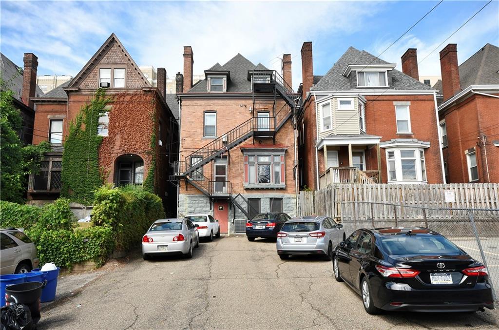 352 North Craig Street, Unit 5 Pittsburgh, PA 15213 - Photo 2 of 10 a car parked in front of a house