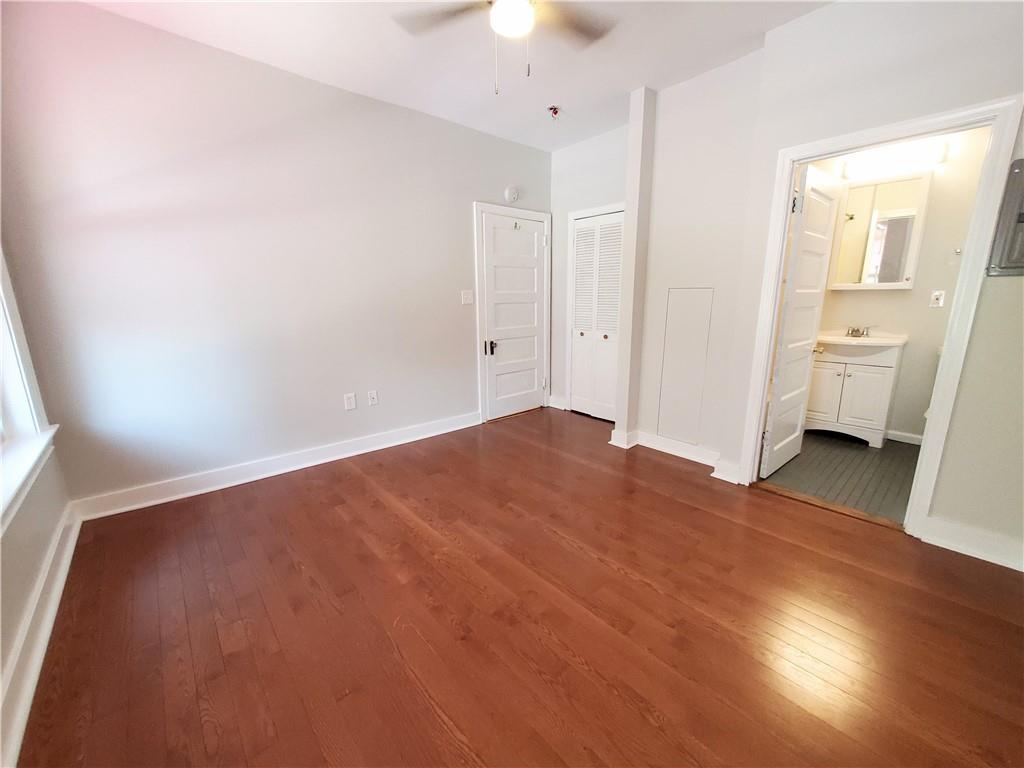 352 North Craig Street, Unit 5 Pittsburgh, PA 15213 - Photo 7 of 10 a view of empty room with wooden floor