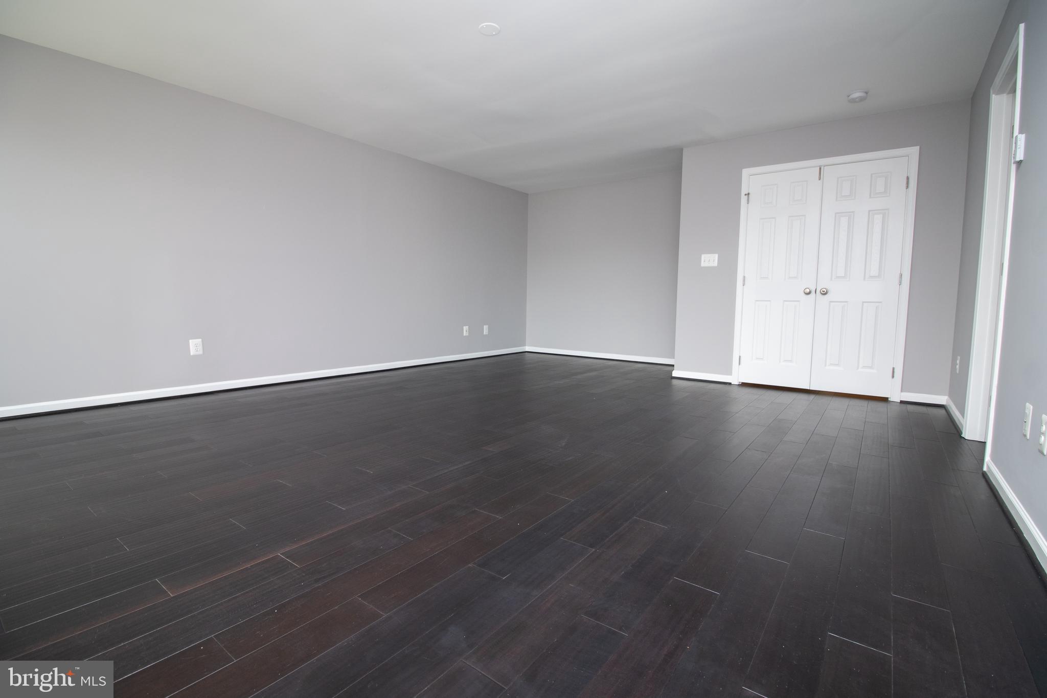 25257 Doolittle Lane Chantilly, VA 20152 - Photo 34 of 52 a view of an empty room and wooden floor