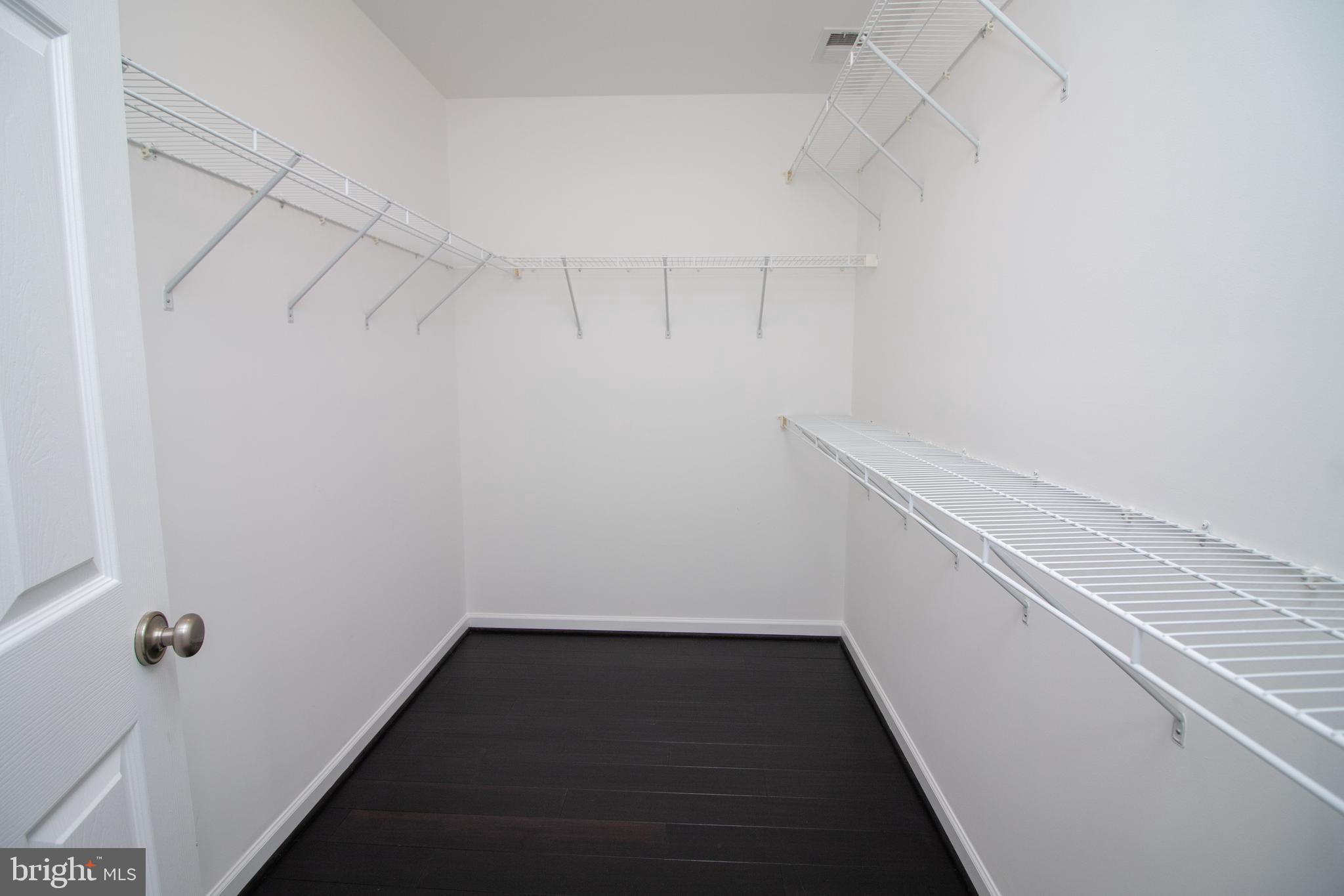 25257 Doolittle Lane Chantilly, VA 20152 - Photo 35 of 52 a view of a room with racks on the wall